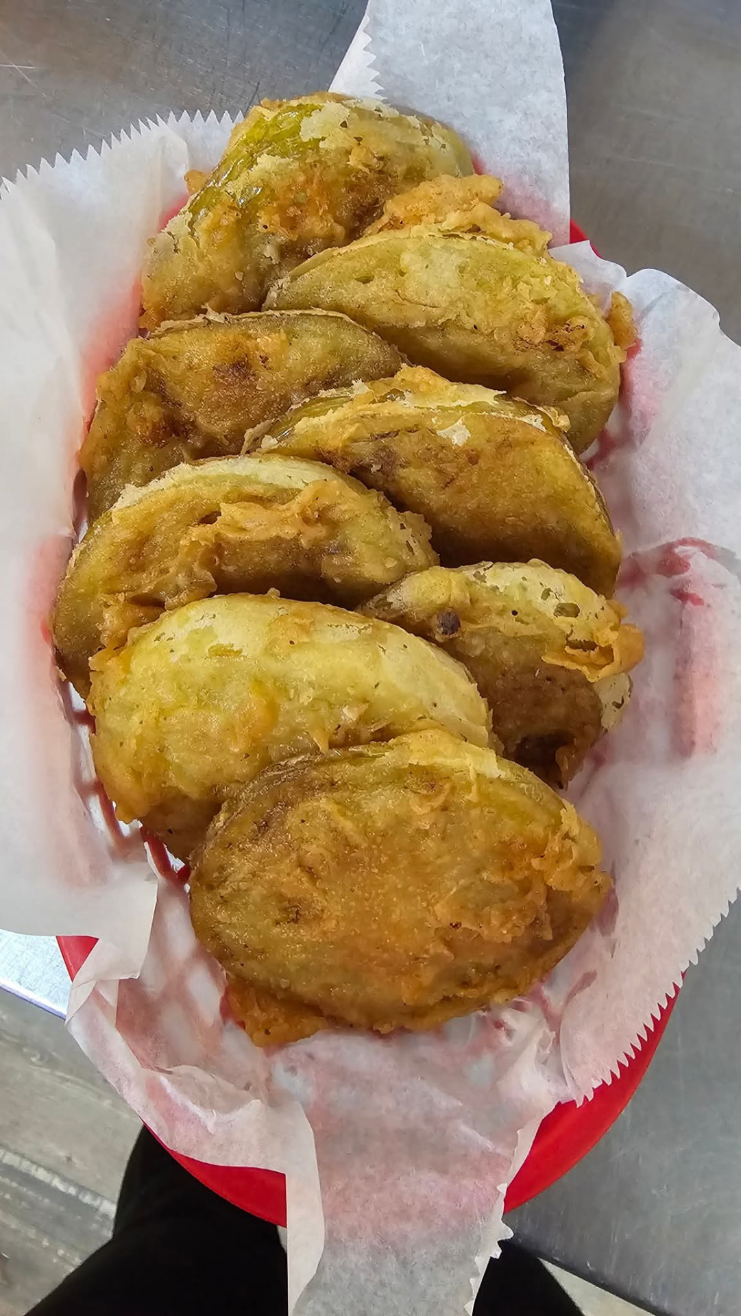 Fresh-fried green tomatoes in a basket