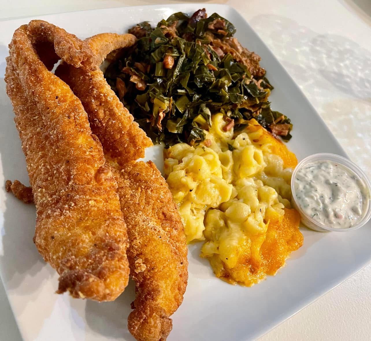 Fried catfish plate with collard greens and mac and cheese